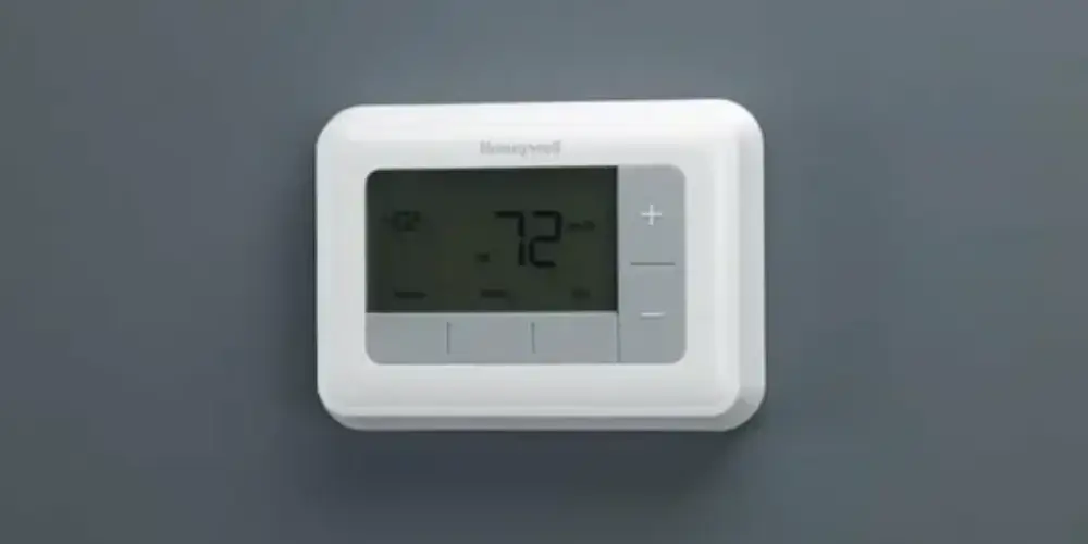 Thermostat designed to control a compatible radiant floor heating system